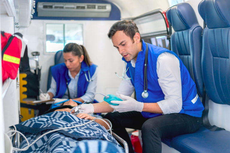 EMTs intubate a covid-19 coronavirus patient outside the hospital